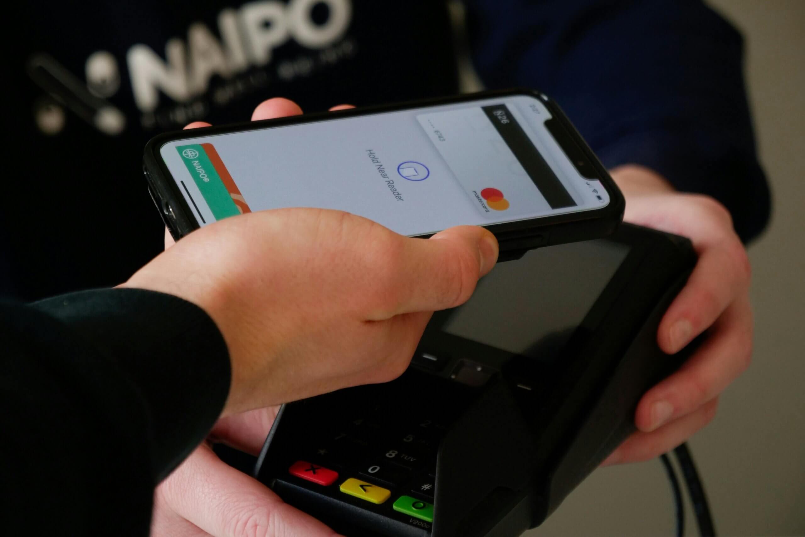 Person making a payment with their phone